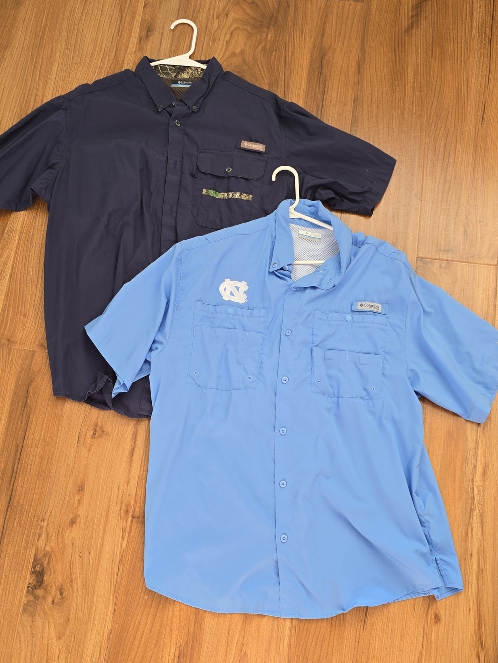 Two Columbia Men's Short-Sleeve Button Shirts - Light Blue and dark blue.
